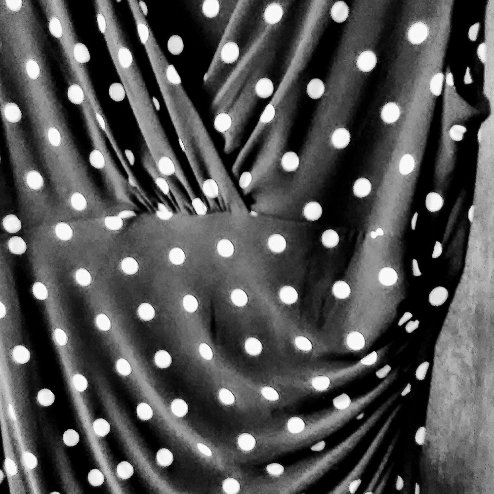 Black and white polka dot wrap dress.